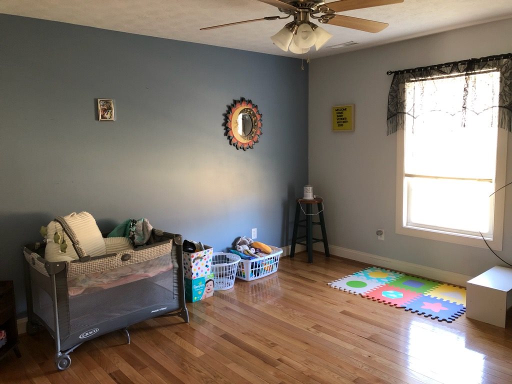1692 Mt Torrey Road Lyndhurst, VA 22952 - Photo 10 of 14 a living room with furniture and a window