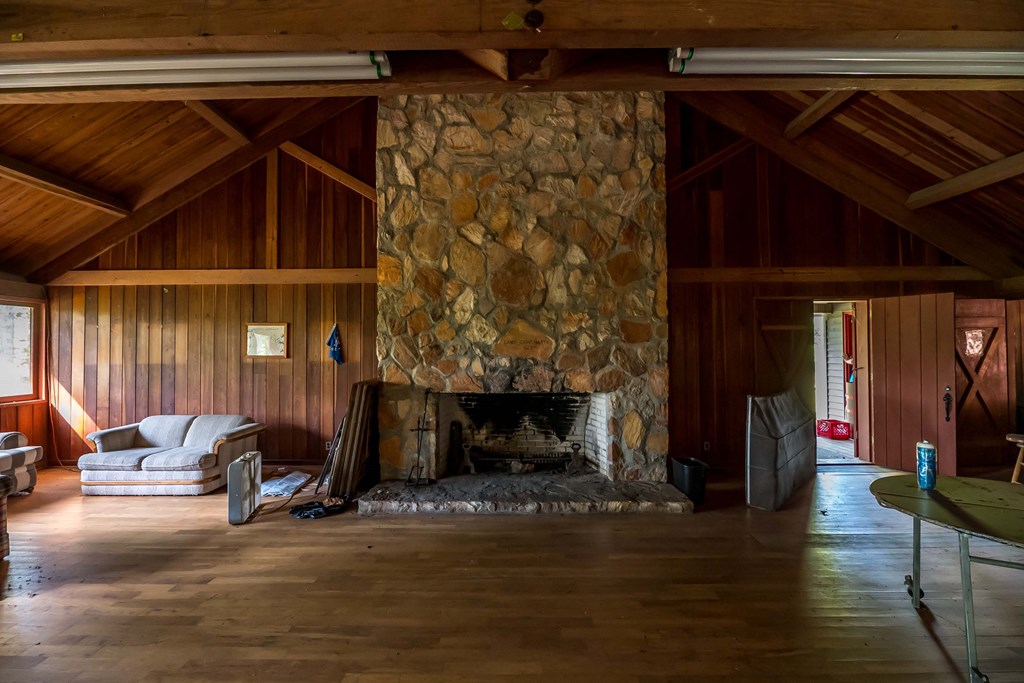829 Trammell Mill Road Shiloh, GA 31826 - Photo 19 of 46 Stone Fireplace in the Dining Hall