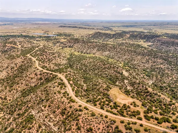 a view of an ocean and a mountain