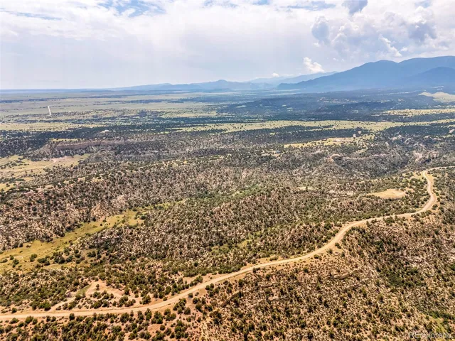 a view of an ocean and a mountain