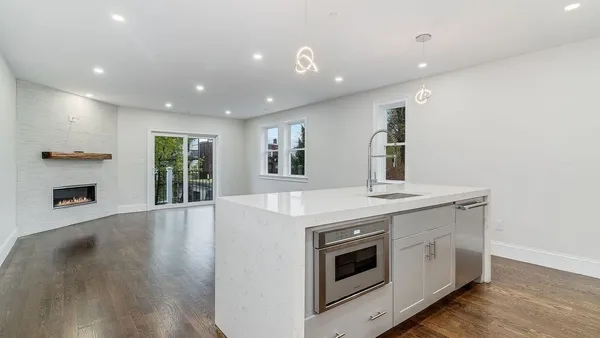 a kitchen with a stove and a dishwasher