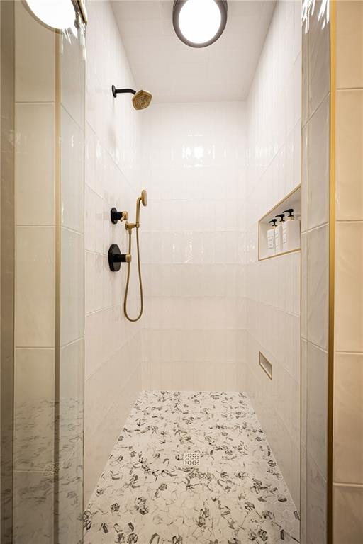 6810 Lullwater Road Cumming, GA 30040 - Photo 30 of 63 a bathroom with a shower