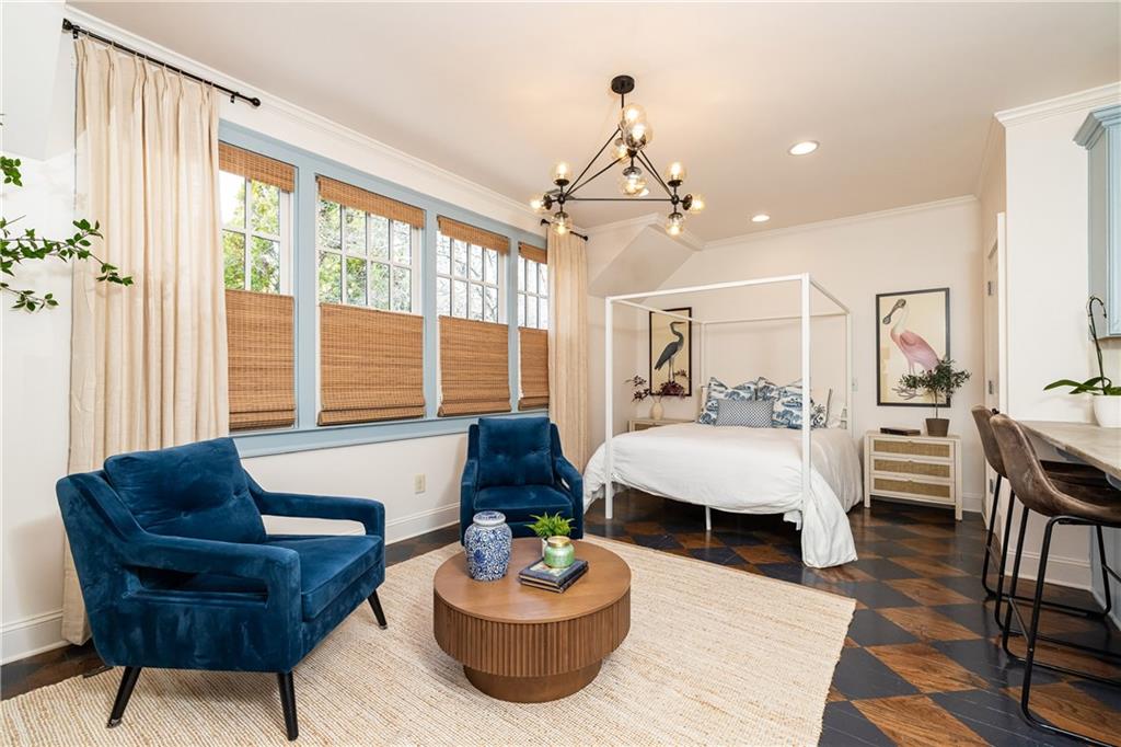 6810 Lullwater Road Cumming, GA 30040 - Photo 45 of 63 a living room with furniture and a large window