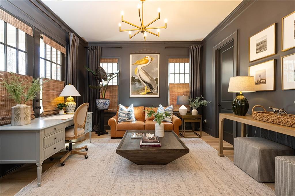 6810 Lullwater Road Cumming, GA 30040 - Photo 9 of 63 a living room with furniture and a large window