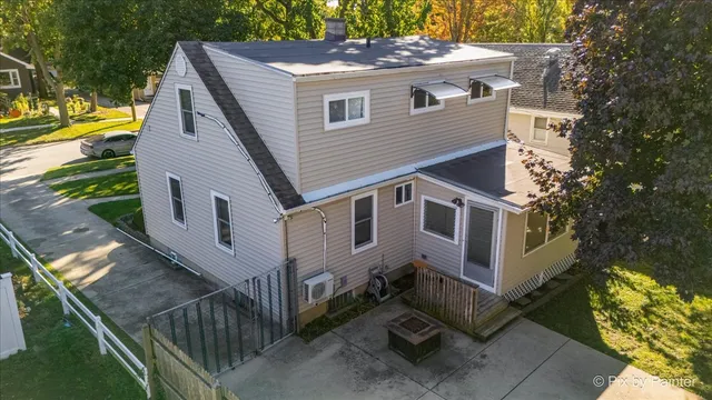 front view of house with a swimming pool