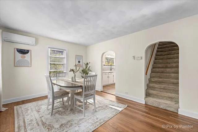 a view of a dining room with furniture
