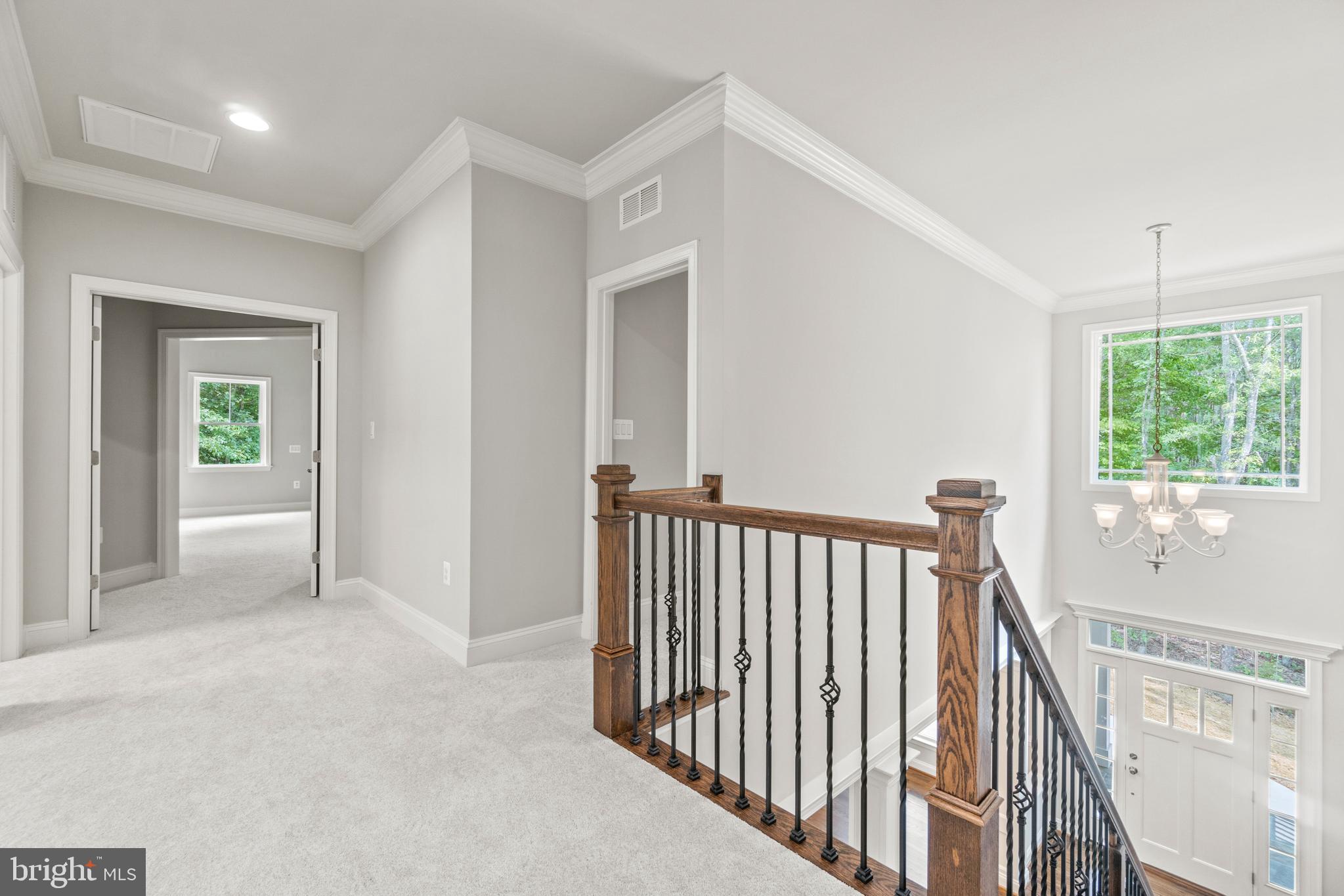 13741 Orlando Road Nokesville, VA 20181 - Photo 31 of 41 a view of a hallway with windows