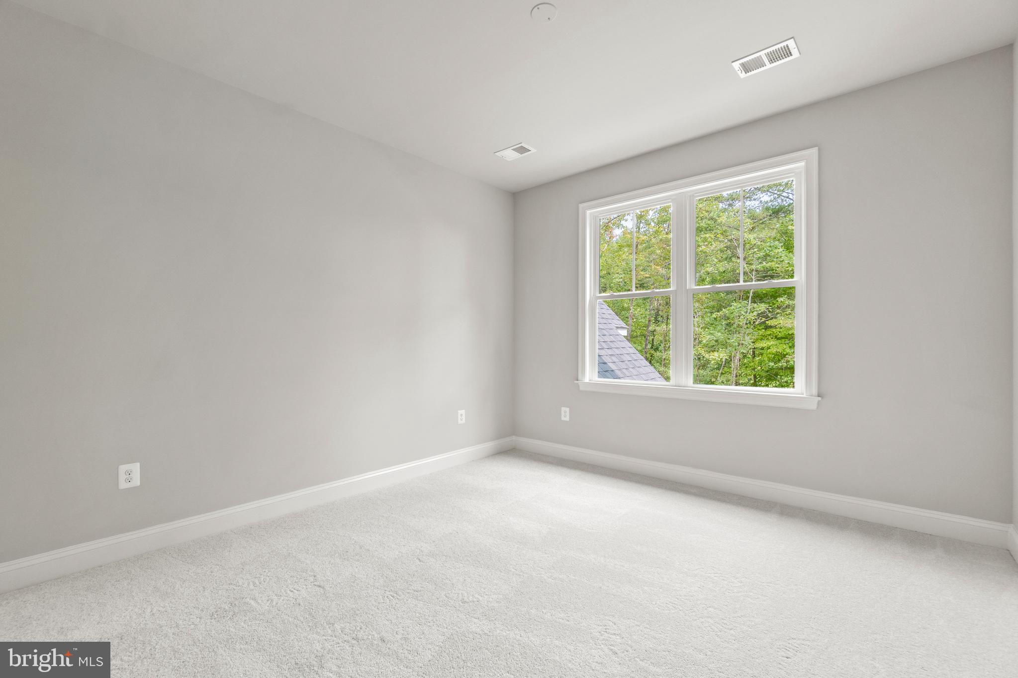 13741 Orlando Road Nokesville, VA 20181 - Photo 33 of 41 an empty room with windows