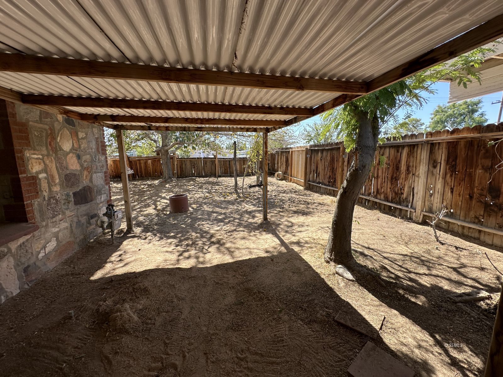 245 South Sanders Street Ridgecrest, CA 93555 - Photo 13 of 14 a view of a backyard of a house