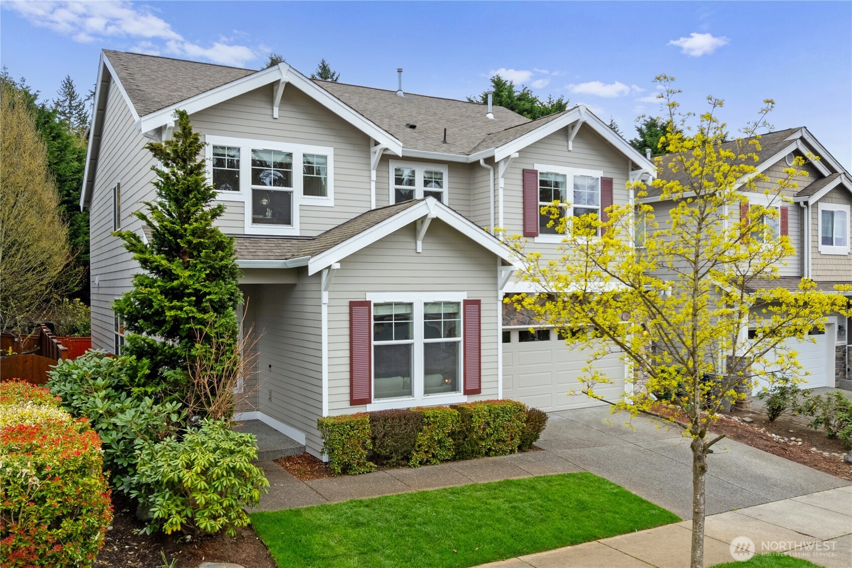 22829 36th Avenue Southeast Bothell, WA 98021 - Photo 1 of 39 a view of a yard in front of house