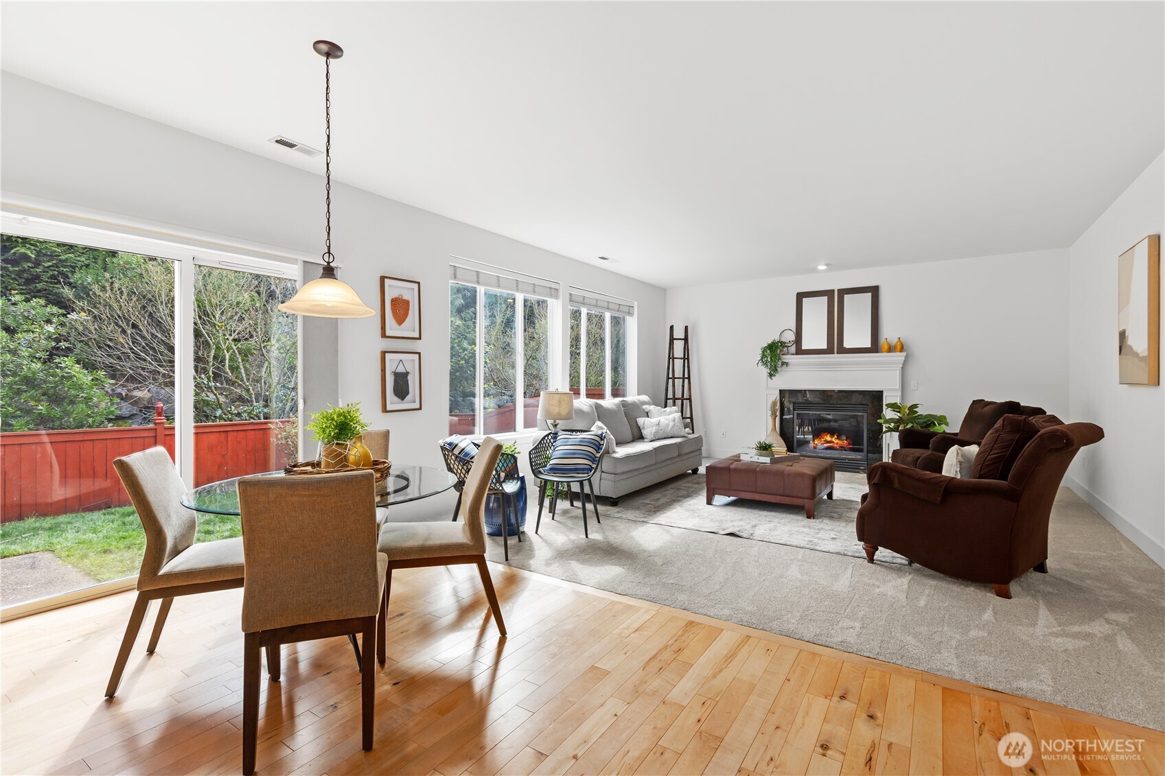 22829 36th Avenue Southeast Bothell, WA 98021 - Photo 15 of 39 a living room with furniture a large window and a wooden floor