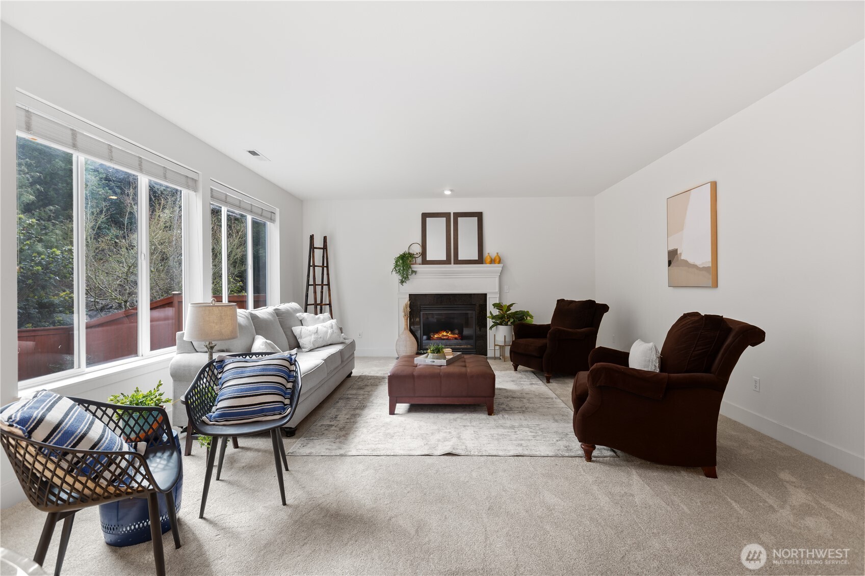 22829 36th Avenue Southeast Bothell, WA 98021 - Photo 16 of 39 a living room with furniture and a fireplace