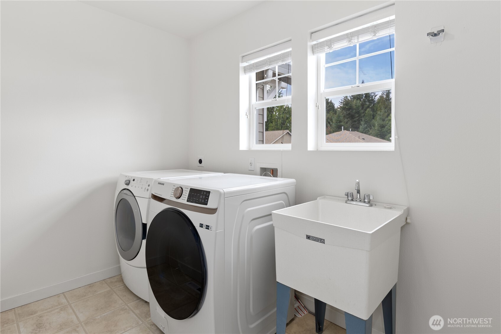 22829 36th Avenue Southeast Bothell, WA 98021 - Photo 32 of 39 a utility room with dryer and washer