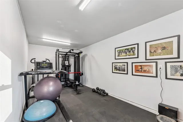 a view of swimming pool with outdoor seating and plants
