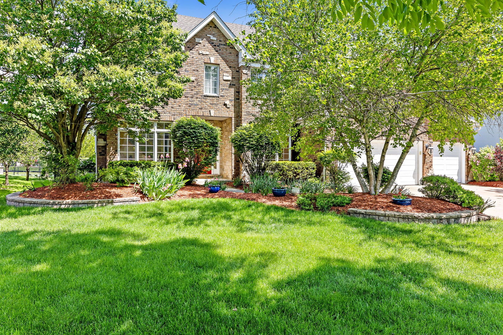 2531 Spartina Road Naperville, IL 60564 - Photo 1 of 39 a front view of a house with garden