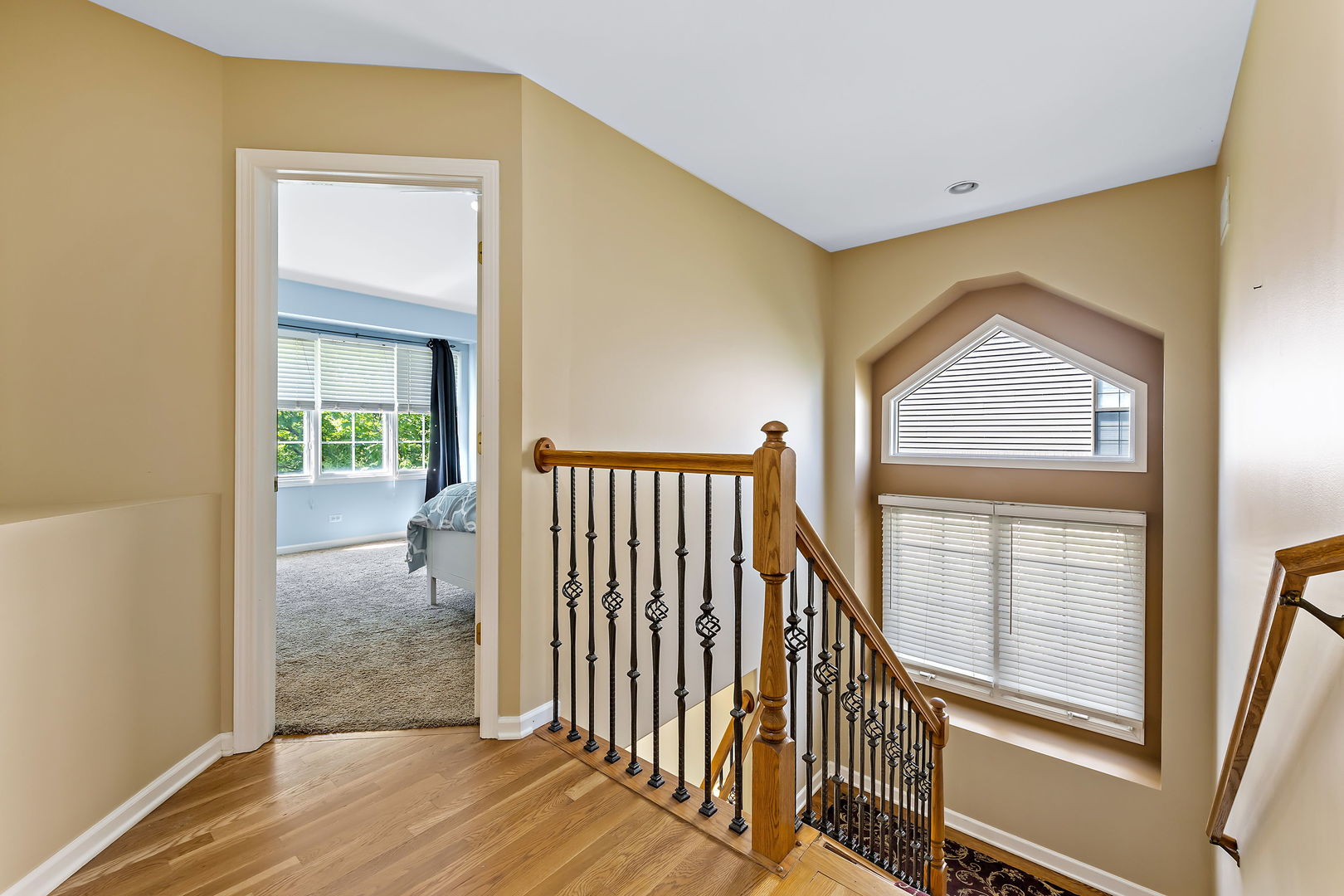 2531 Spartina Road Naperville, IL 60564 - Photo 16 of 39 a view of a hallway with wooden floor and door