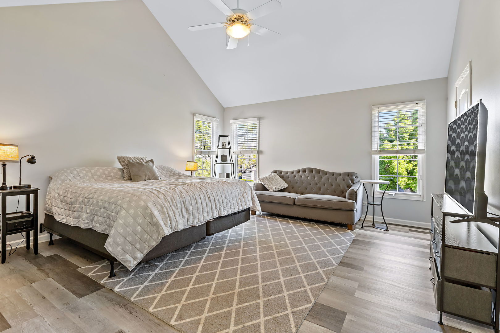 2531 Spartina Road Naperville, IL 60564 - Photo 17 of 39 a bedroom with a bed and a flat screen tv