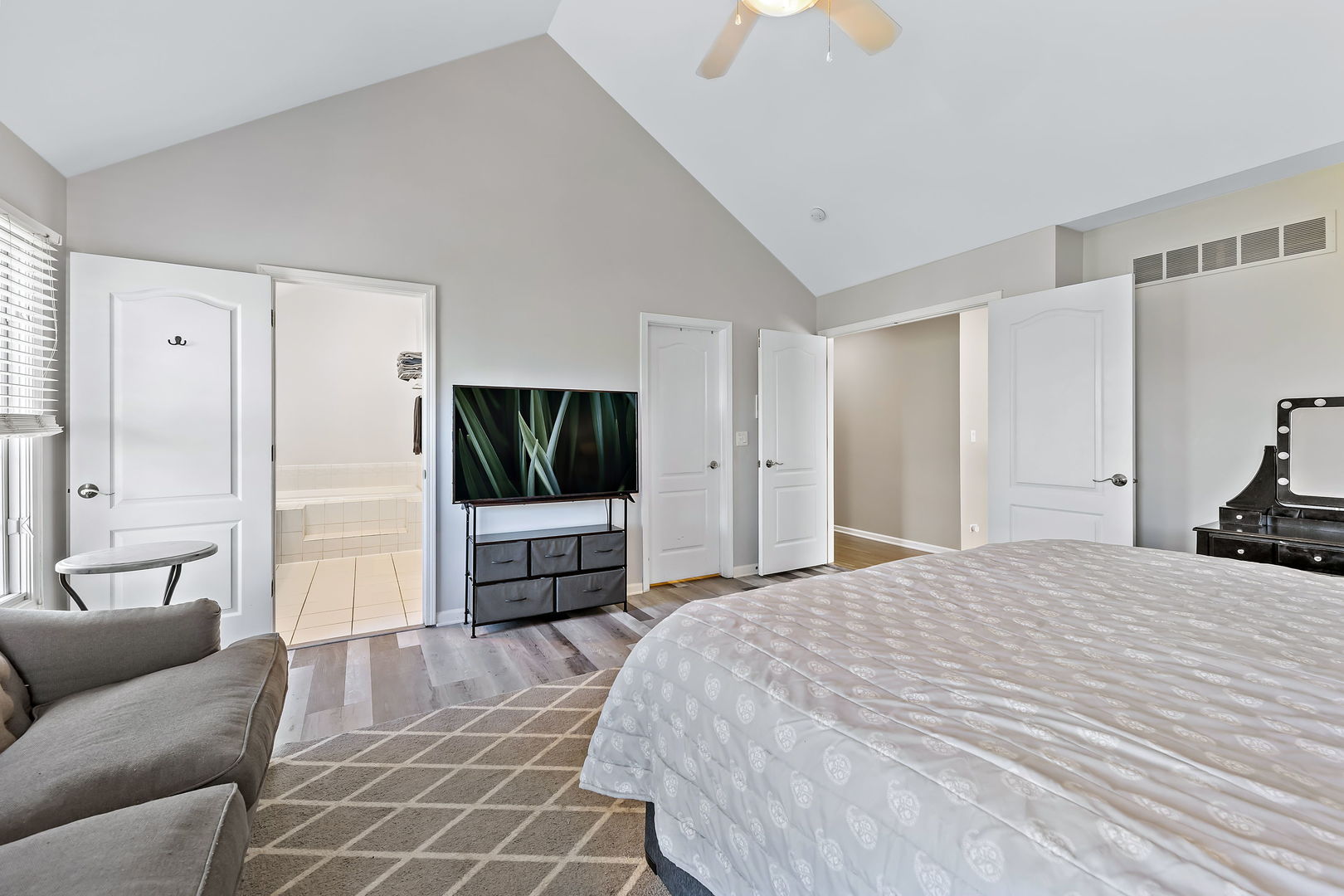 2531 Spartina Road Naperville, IL 60564 - Photo 18 of 39 a bedroom with furniture and a flat screen tv
