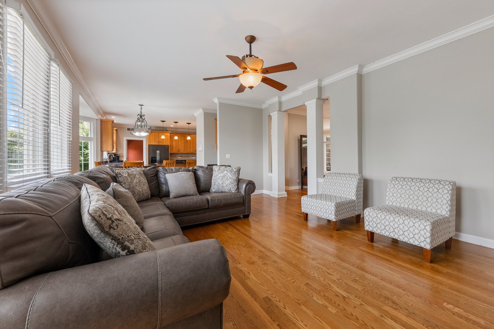 2531 Spartina Road Naperville, IL 60564 - Photo 9 of 39 a living room with furniture and a large window