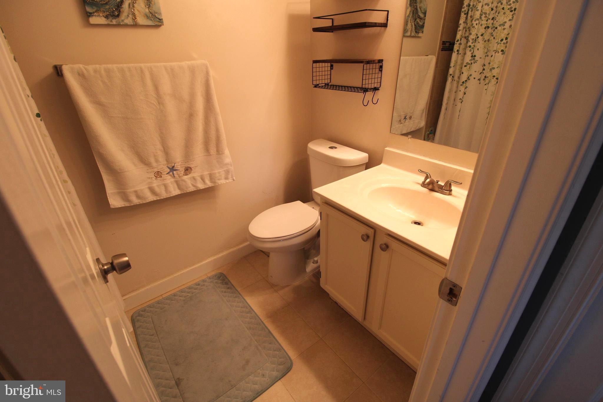 7863 Apache Ridge Court Manassas, VA 20109 - Photo 20 of 38 a bathroom with a sink toilet and shower