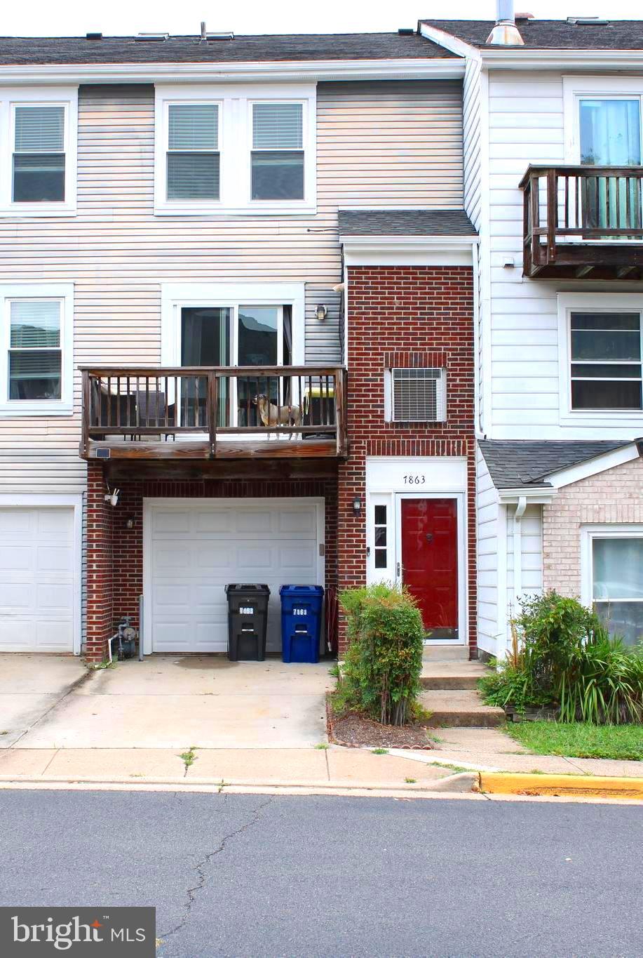 7863 Apache Ridge Court Manassas, VA 20109 - Photo 2 of 38 a view of a house with a swimming pool and a yard