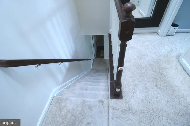 a view of a balcony with chairs