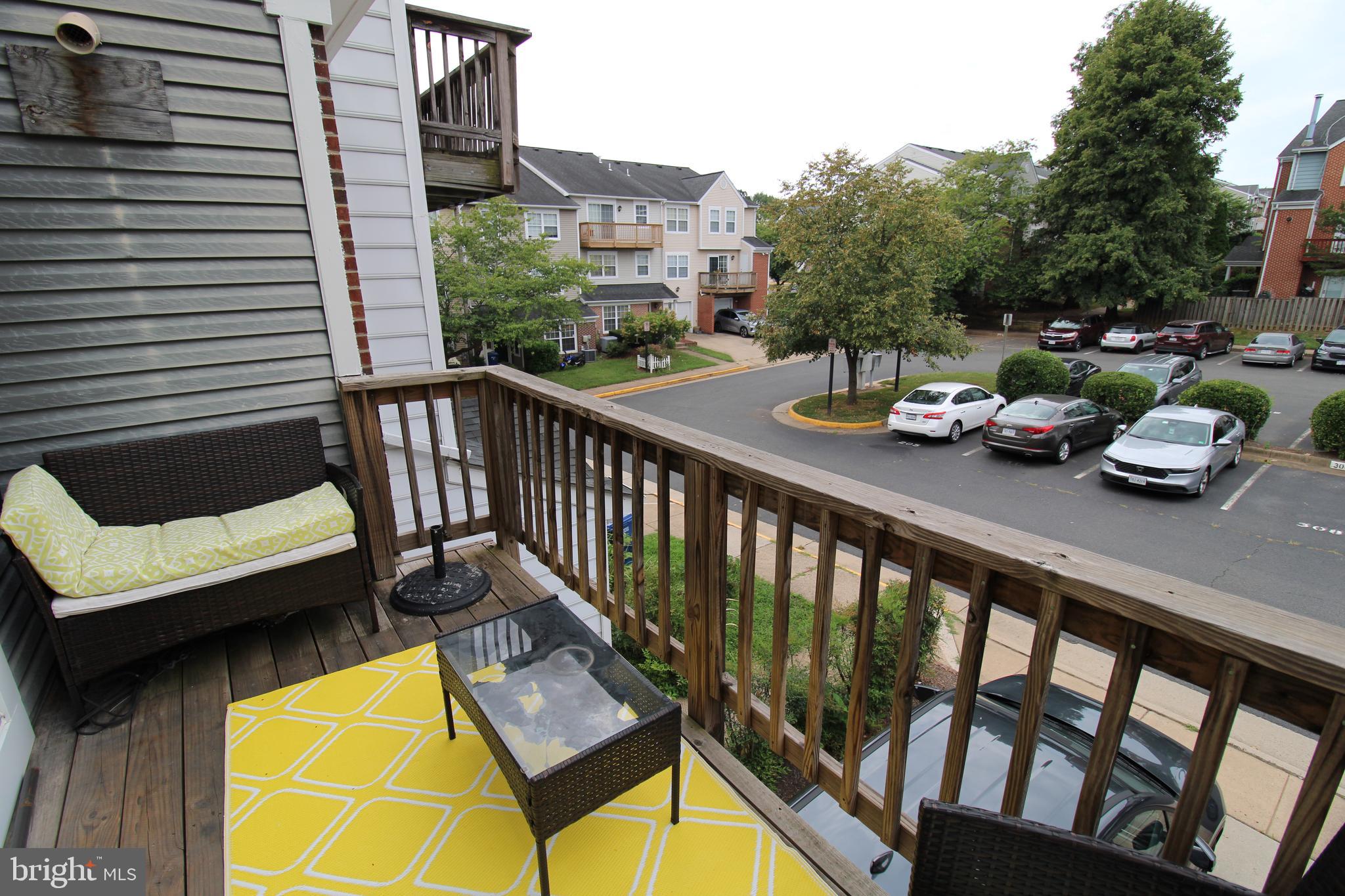 7863 Apache Ridge Court Manassas, VA 20109 - Photo 27 of 38 a view of a chairs and table in the balcony