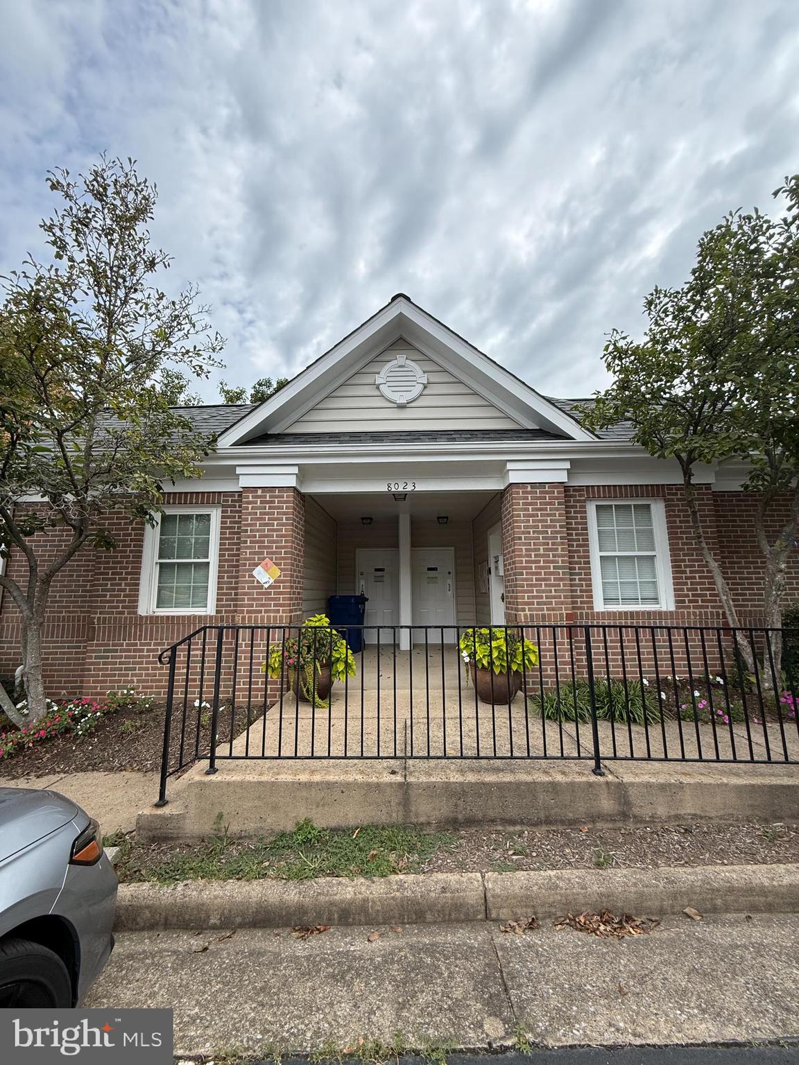 7863 Apache Ridge Court Manassas, VA 20109 - Photo 37 of 38 a front view of a house with a garden and plants