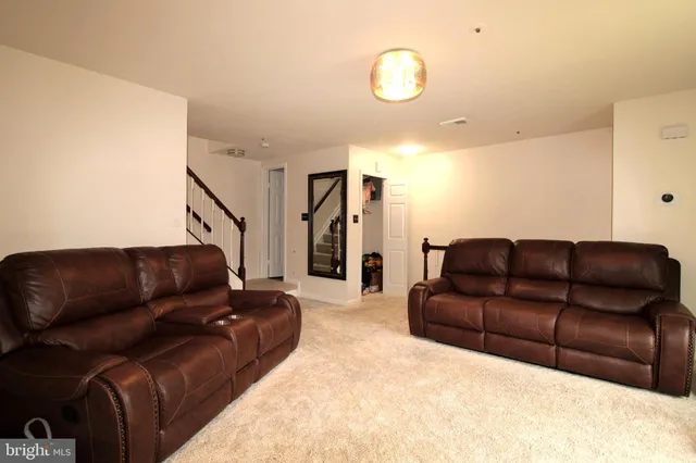 a living room with furniture and a couch