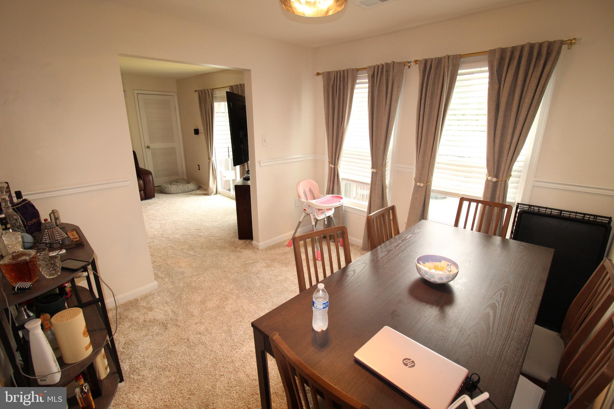 7863 Apache Ridge Court Manassas, VA 20109 - Photo 9 of 38 a view of a workspace with furniture and a window