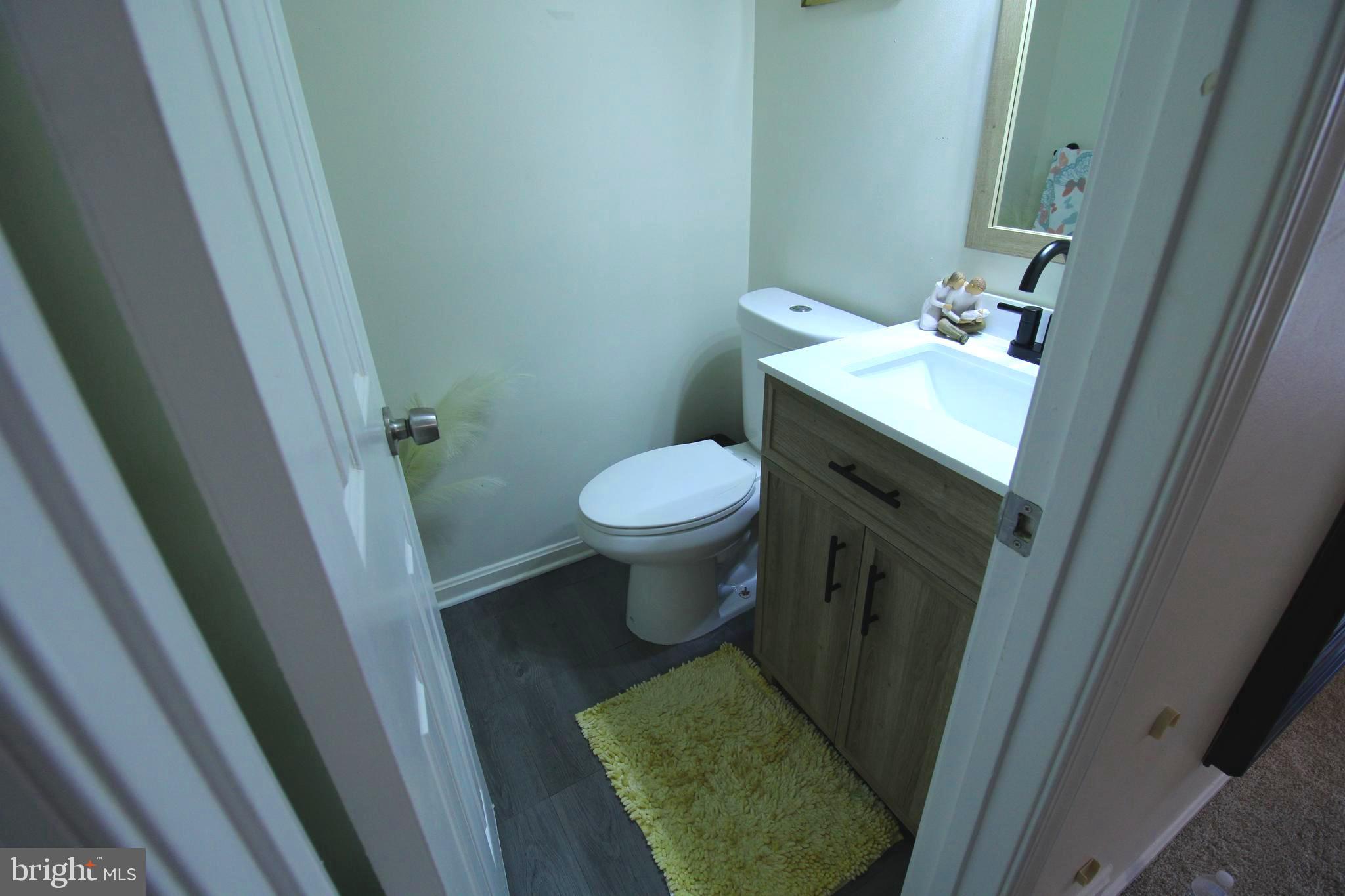 7863 Apache Ridge Court Manassas, VA 20109 - Photo 10 of 38 a bathroom with a sink and toilet