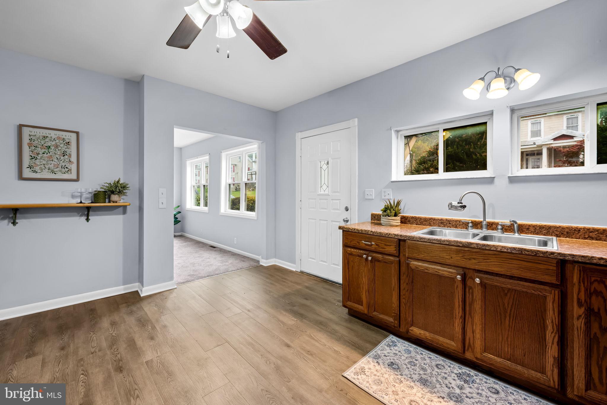 735 Main Street Delta, PA 17314 - Photo 11 of 35 a spacious bathroom with a double vanity sink and a mirror