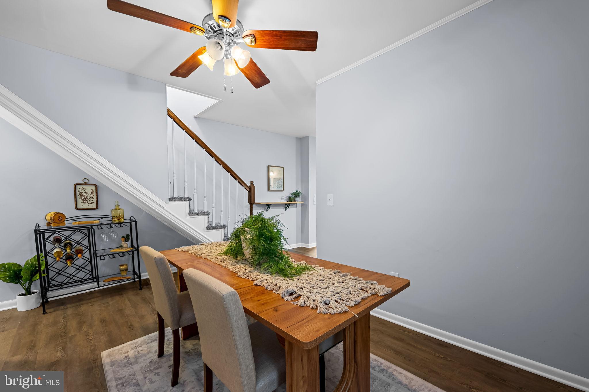 735 Main Street Delta, PA 17314 - Photo 15 of 35 a view of a dining room with furniture and wooden floor