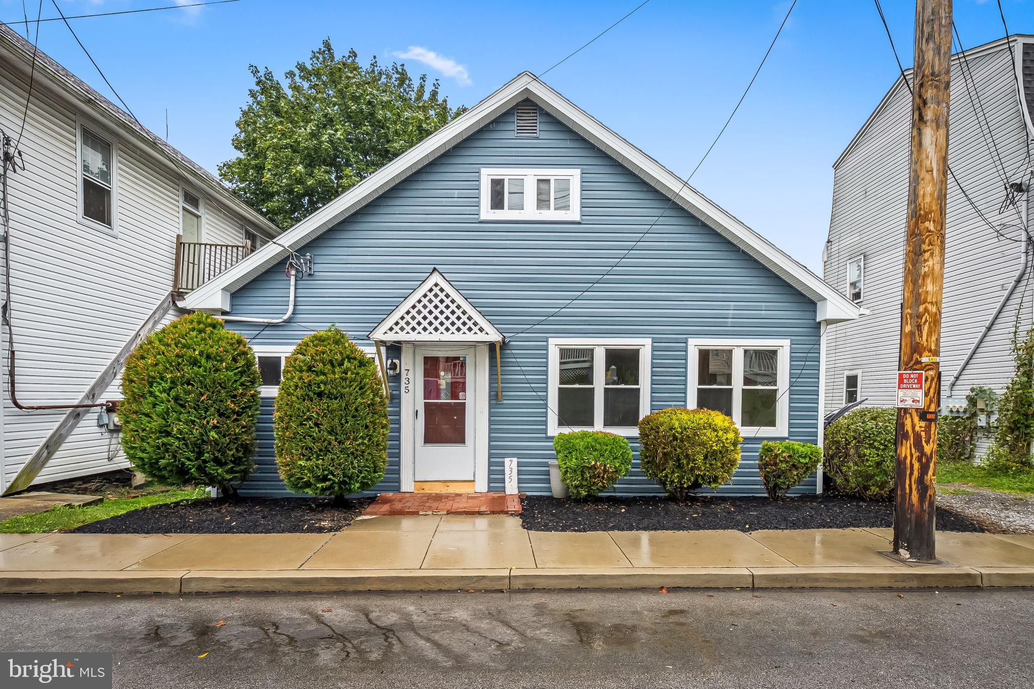 735 Main Street Delta, PA 17314 - Photo 2 of 35 a view of a house and a yard