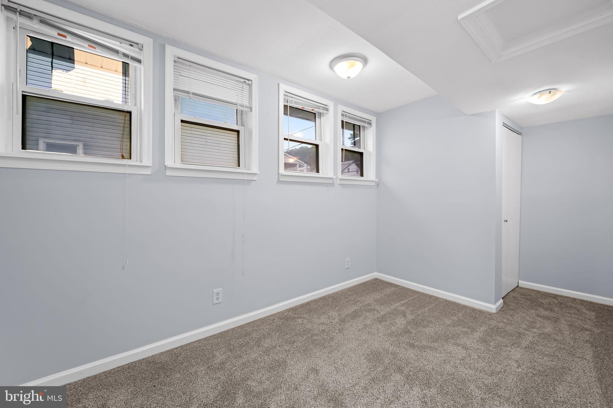 735 Main Street Delta, PA 17314 - Photo 23 of 35 a view of empty room with windows