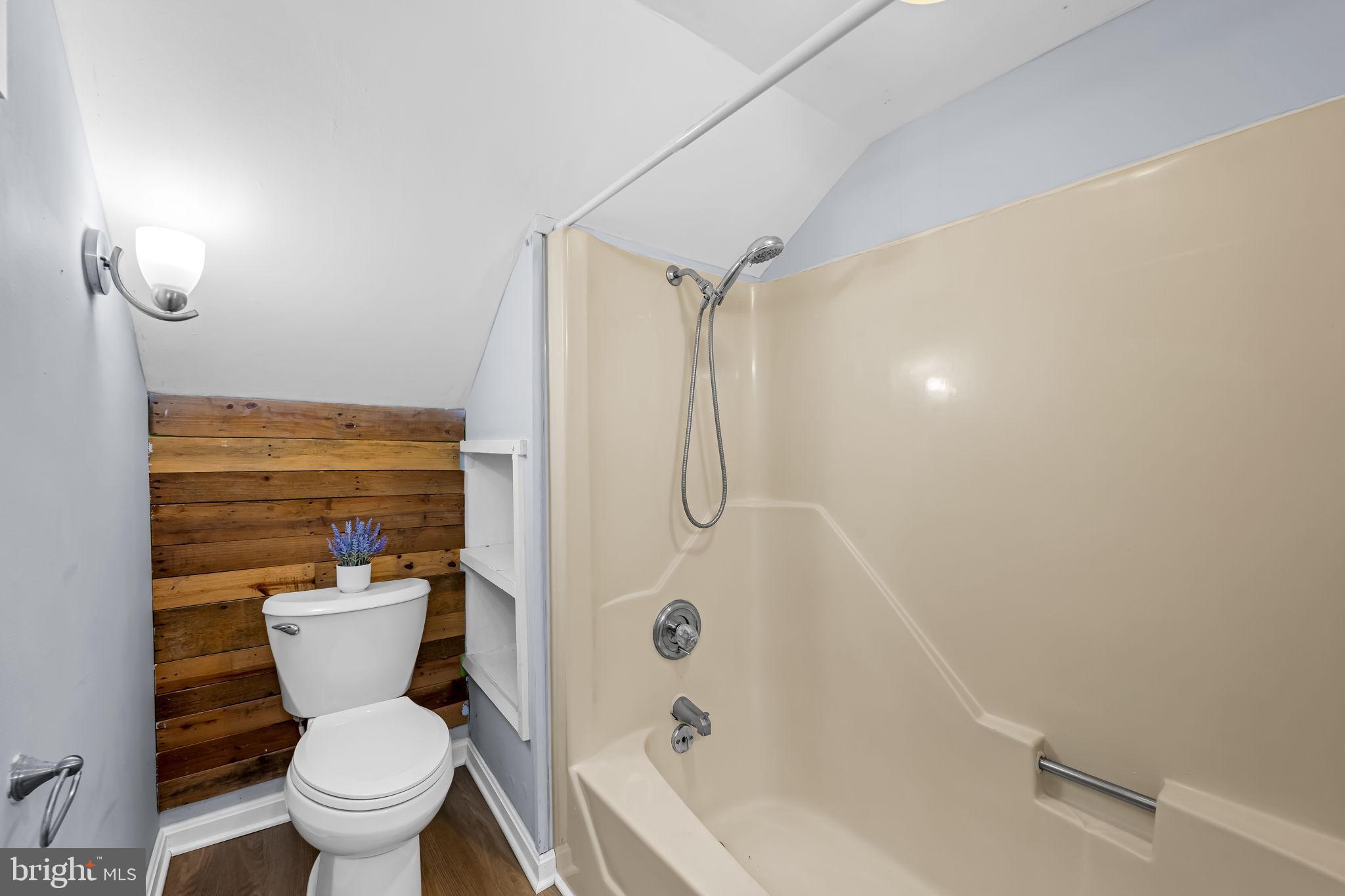 735 Main Street Delta, PA 17314 - Photo 26 of 35 a bathroom with a toilet and a shower