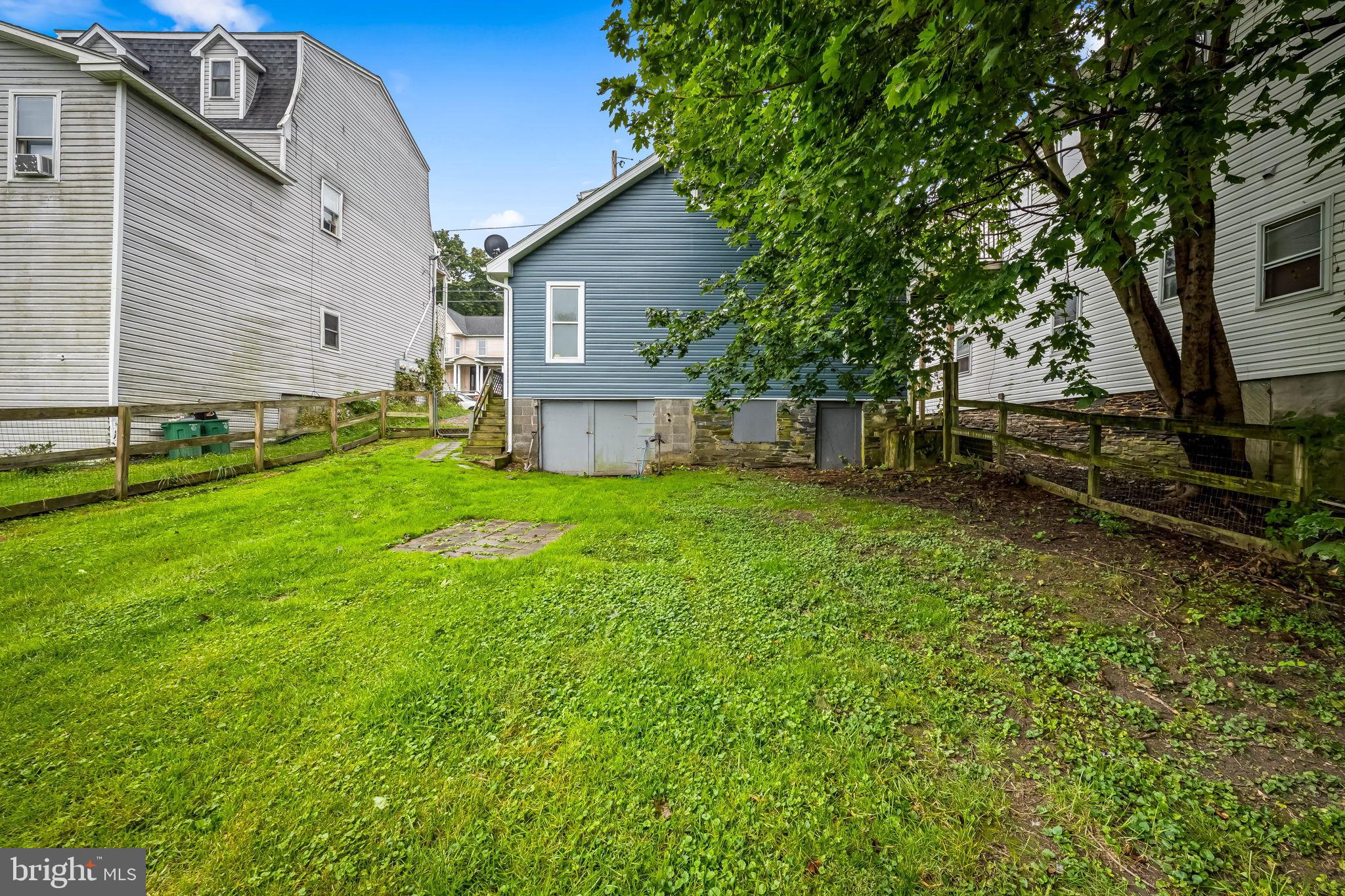 735 Main Street Delta, PA 17314 - Photo 33 of 35 a view of a house with backyard and sitting area