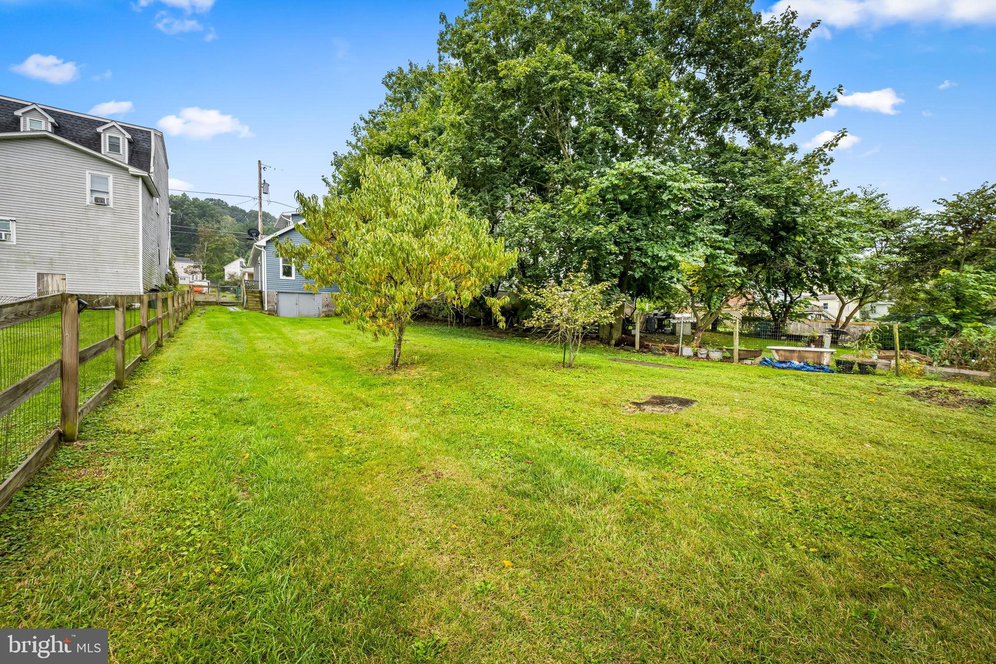 735 Main Street Delta, PA 17314 - Photo 35 of 35 a view of yard with swimming pool and green space