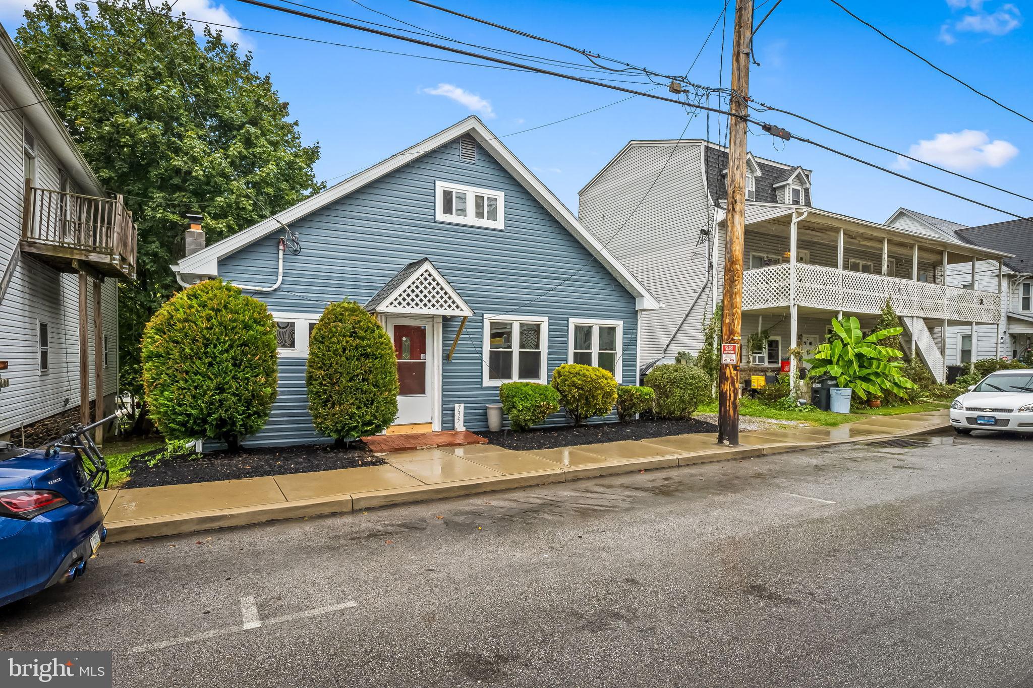 735 Main Street Delta, PA 17314 - Photo 4 of 35 a front view of a house with a yard
