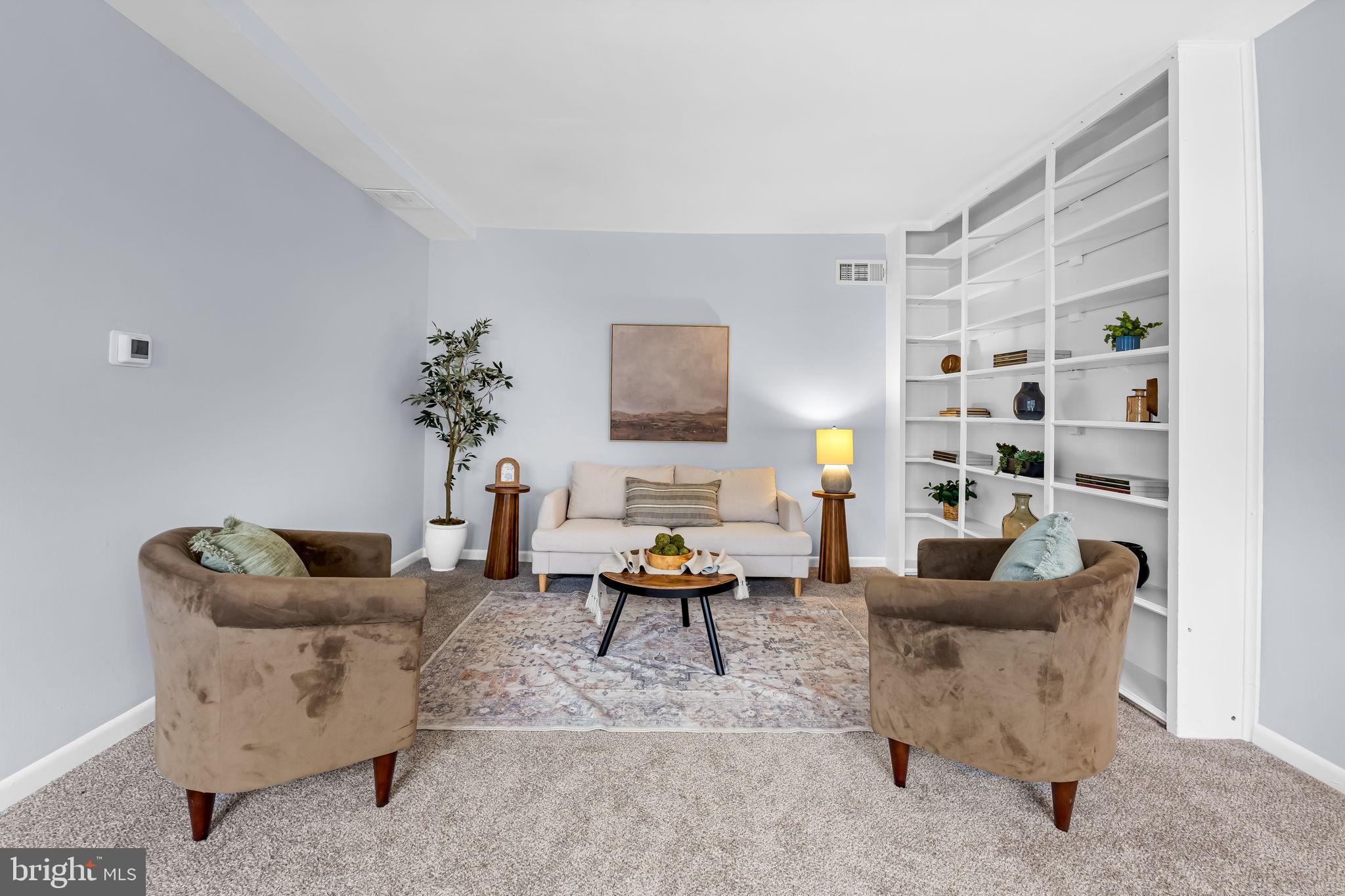 735 Main Street Delta, PA 17314 - Photo 5 of 35 a living room with furniture and a potted plant