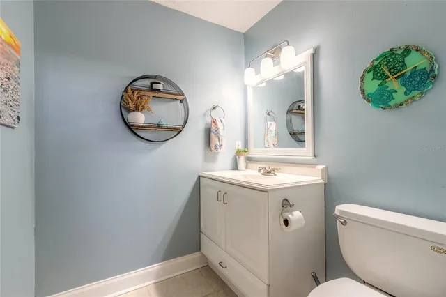 a bathroom with a toilet and a sink