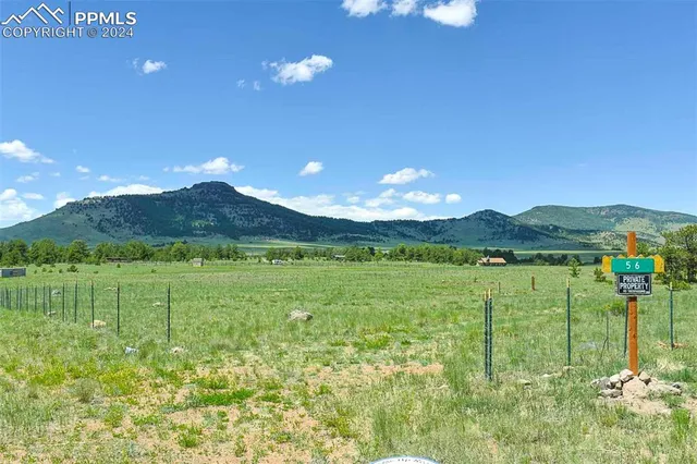 a view of lake with green space
