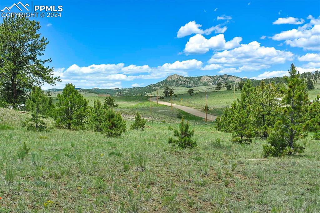 56 View Lane Guffey, CO 80820 - Photo 8 of 38 a view of a lake from a yard