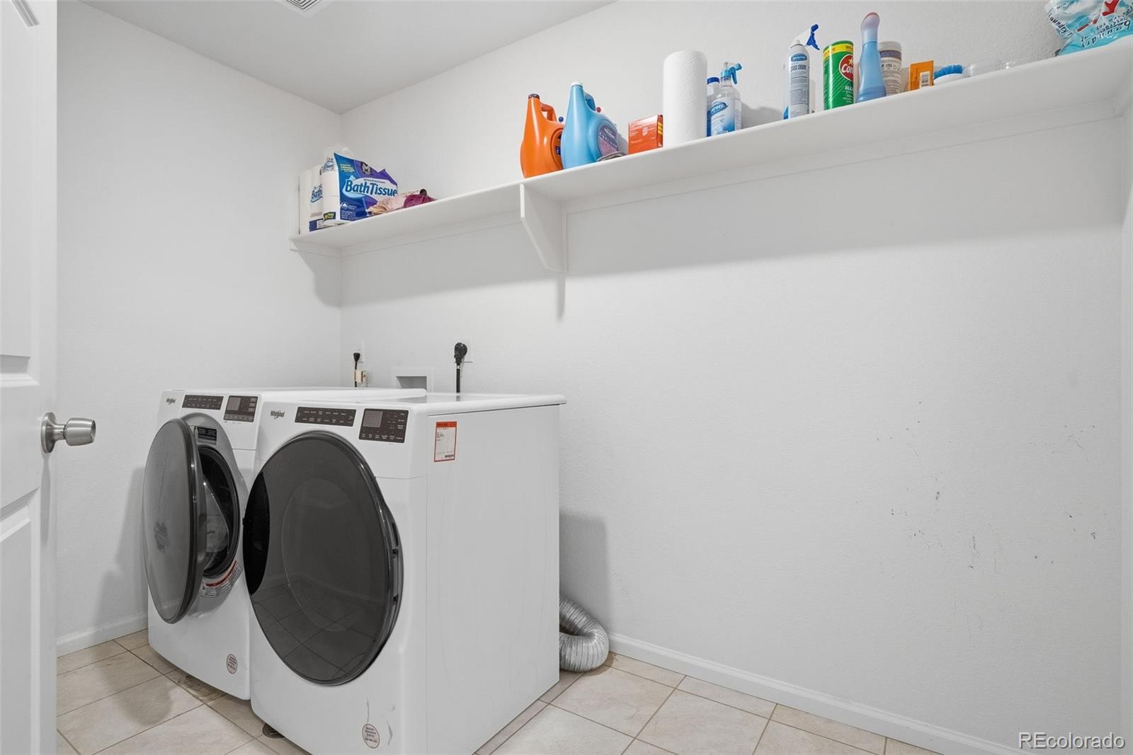 5017 Liverpool Street Denver, CO 80249 - Photo 30 of 42 a utility room with dryer and washer