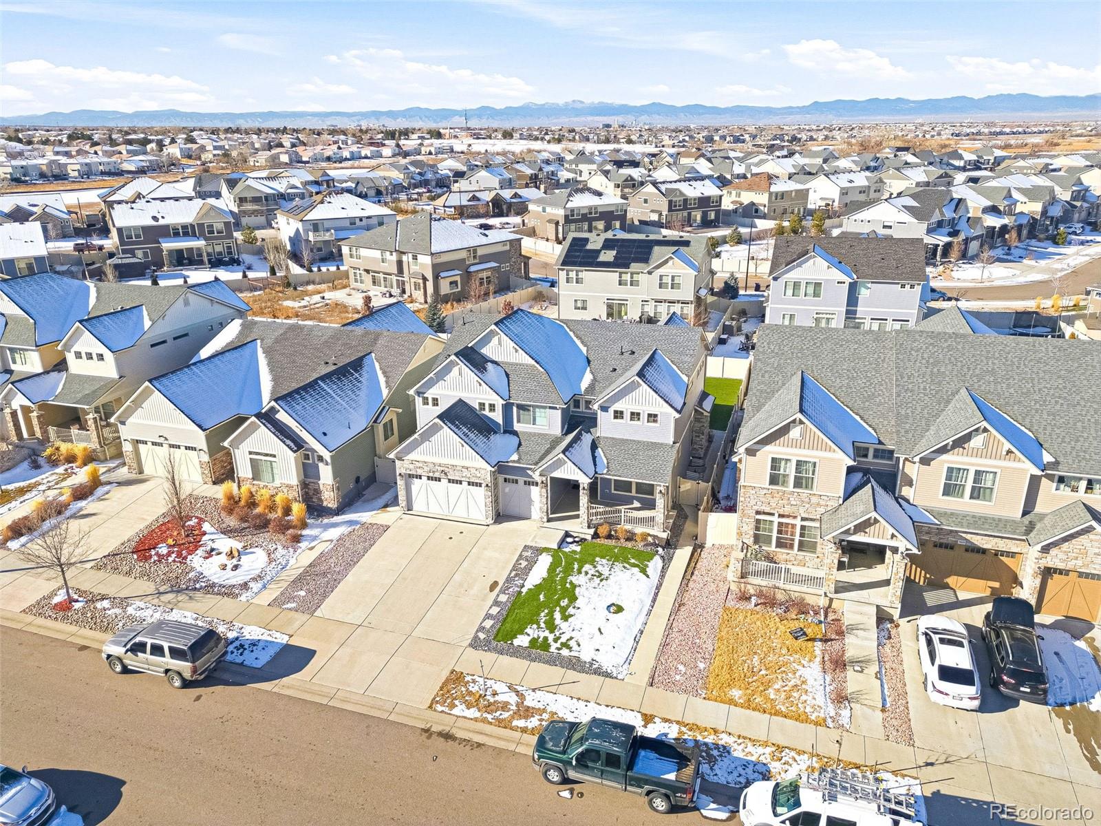 5017 Liverpool Street Denver, CO 80249 - Photo 39 of 42 an aerial view of residential houses with outdoor space
