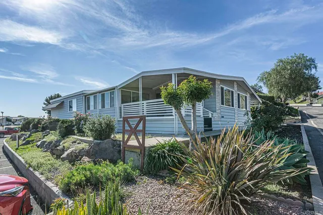 a swimming pool view with a outdoor seating