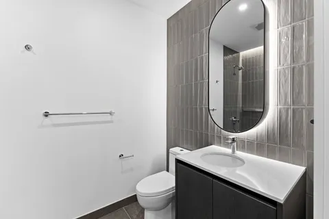 a bathroom with a bathtub and shower