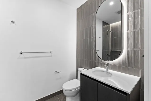 a bathroom with a bathtub and shower