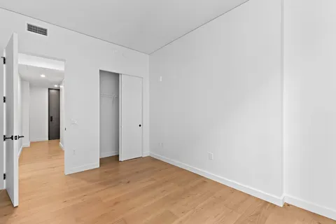 a kitchen with stainless steel appliances a stove and a refrigerator