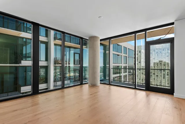 a large kitchen with a large window